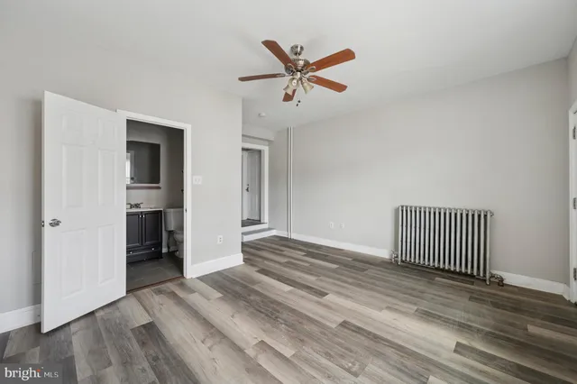 a bathroom with a sink a mirror and a bathtub