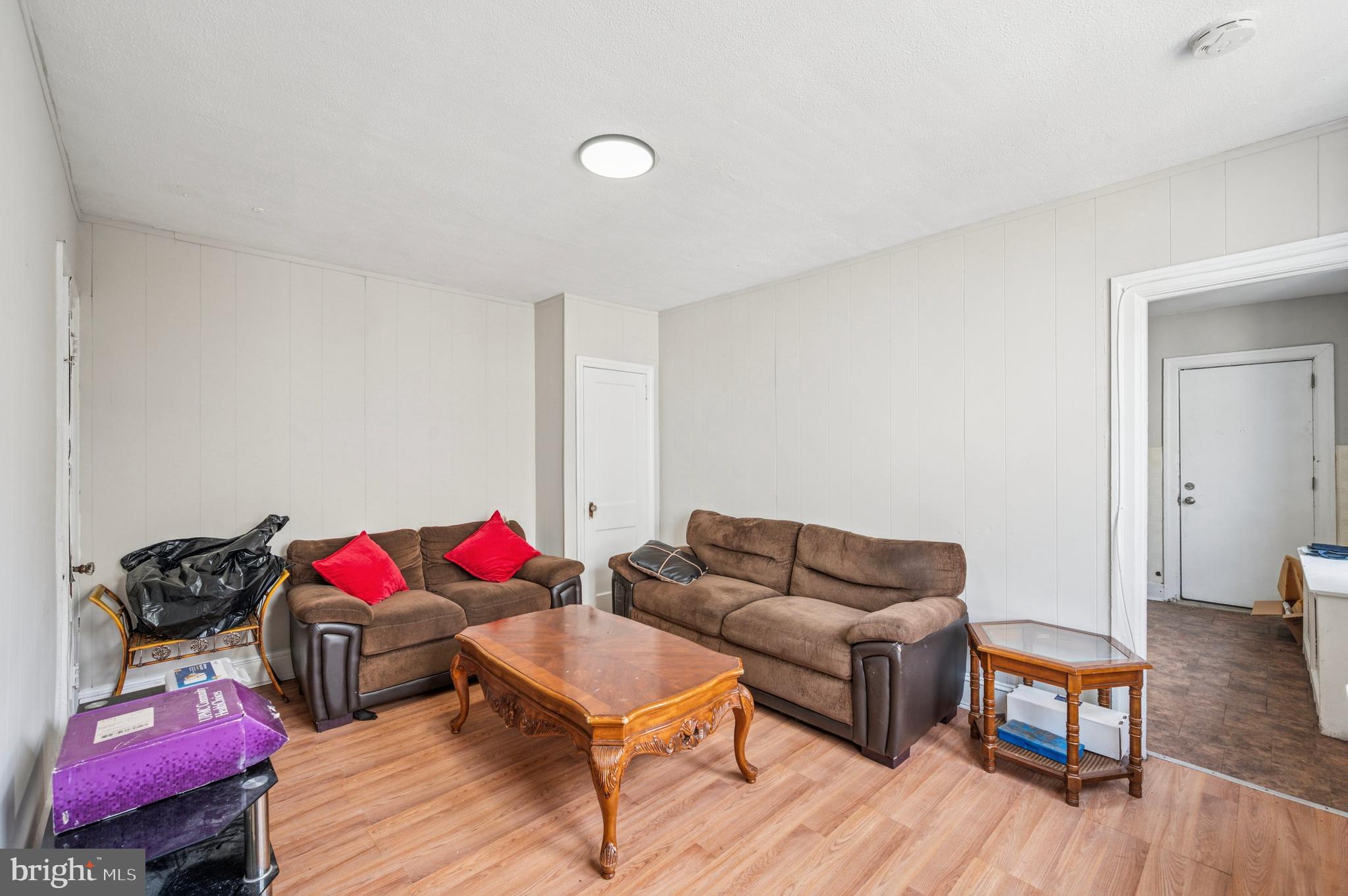 424 North 64th Street Philadelphia, PA 19151 - Photo 25 of 35 a living room with furniture and a wooden floor