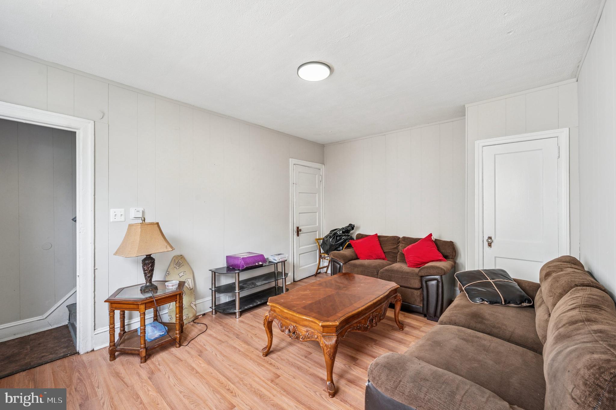 424 North 64th Street Philadelphia, PA 19151 - Photo 26 of 35 a living room with furniture and a wooden floor