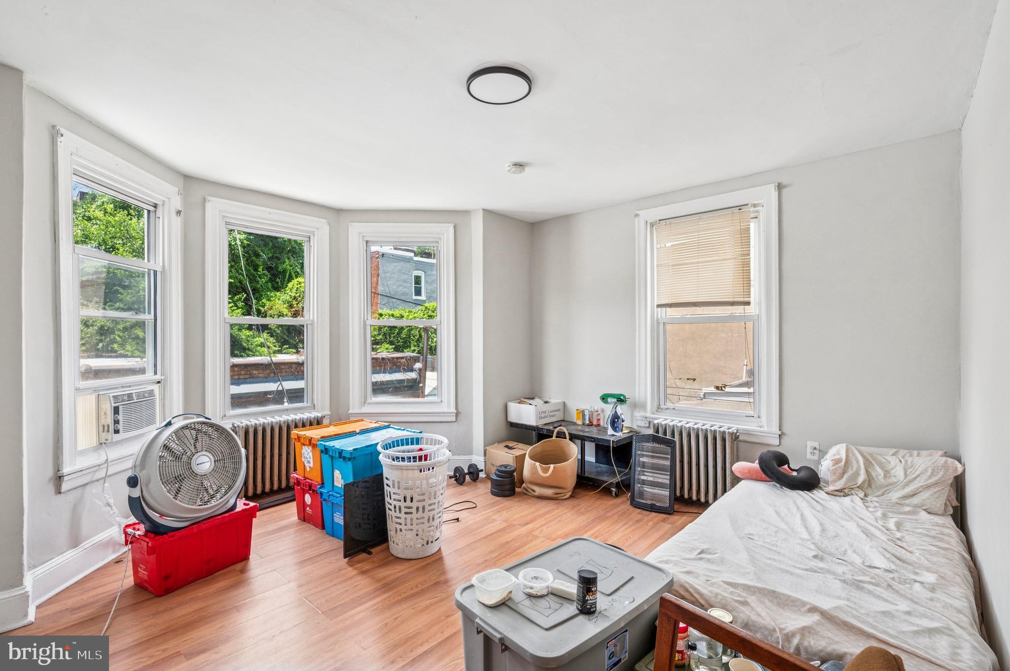 424 North 64th Street Philadelphia, PA 19151 - Photo 33 of 35 a bedroom with furniture and a window