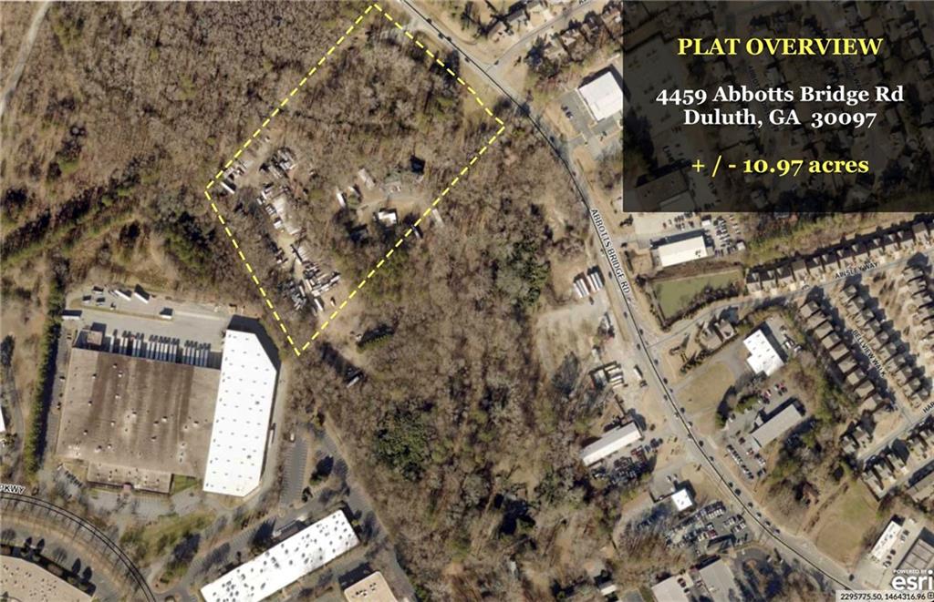 4349 Abbotts Bridge Road Duluth, GA 30097 - Photo 2 of 38 a sign that is on the side of a road