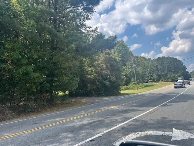 a view of a house with a big yard