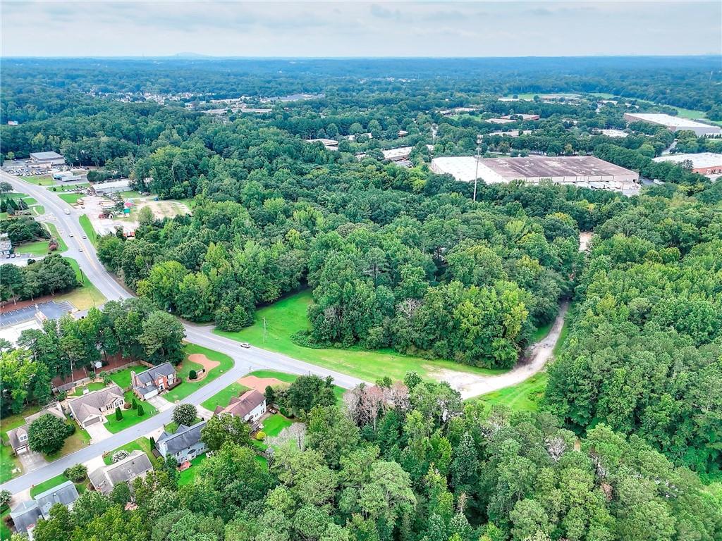 4349 Abbotts Bridge Road Duluth, GA 30097 - Photo 7 of 38 an aerial view of residential houses with outdoor space and trees