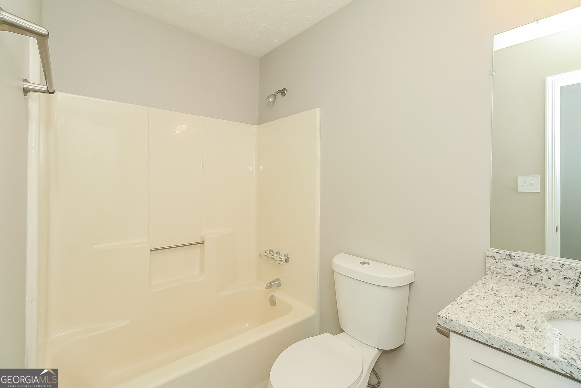 2875 Kathryn Circle Southwest Atlanta, GA 30331 - Photo 13 of 18 a white toilet sitting next to a bath tub
