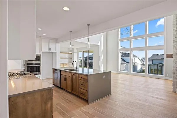 $975,900 | 517 Bentwater Drive, Raymore, MO 64083