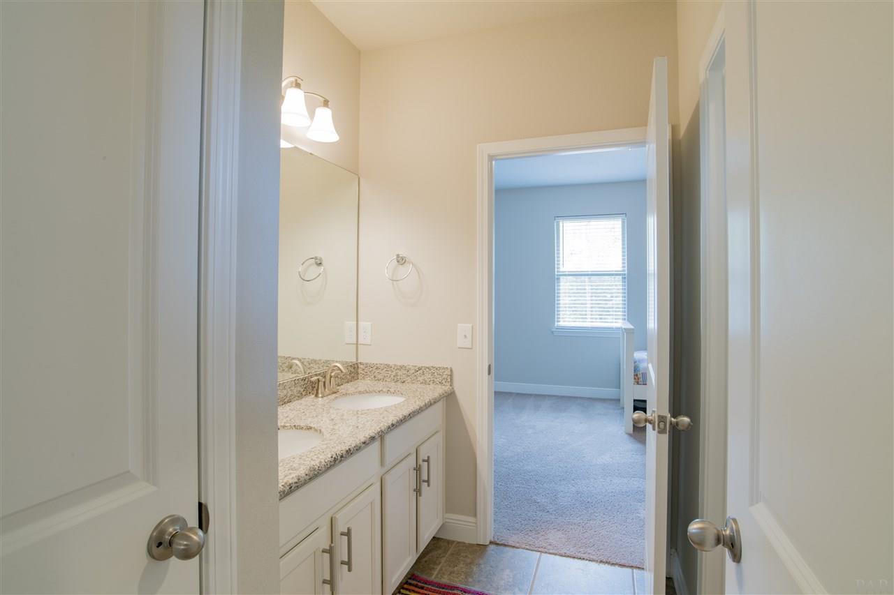 1534 Redfish Point Road Gulf Breeze, FL 32563 - Photo 25 of 37 Between 3rd and 4th bedrooms