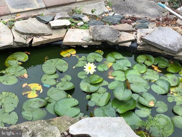 9337 Millbrook Road Ellicott City, MD 21042 - Photo 8 of 33 a bathroom with a sink and garden view