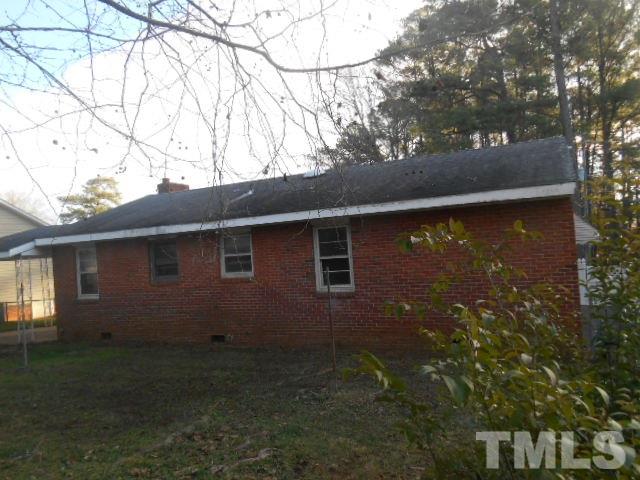 432 Peyton Street Raleigh, NC 27610 - Photo 2 of 12 a backyard of a house with lots of green space