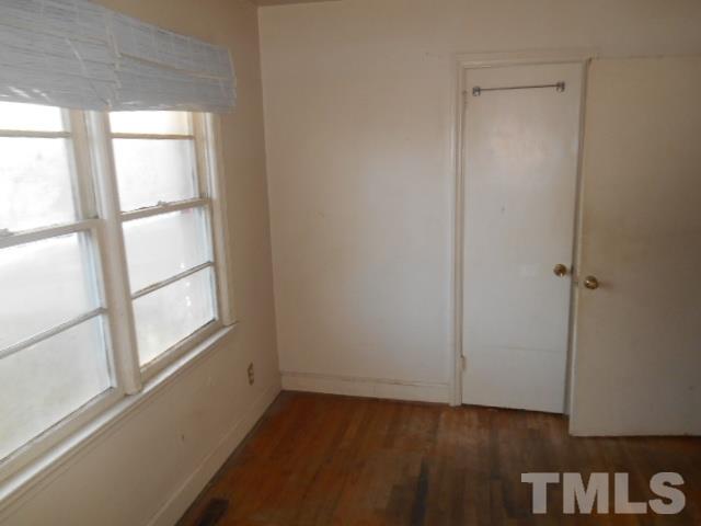 432 Peyton Street Raleigh, NC 27610 - Photo 12 of 12 a view of an empty room with a window