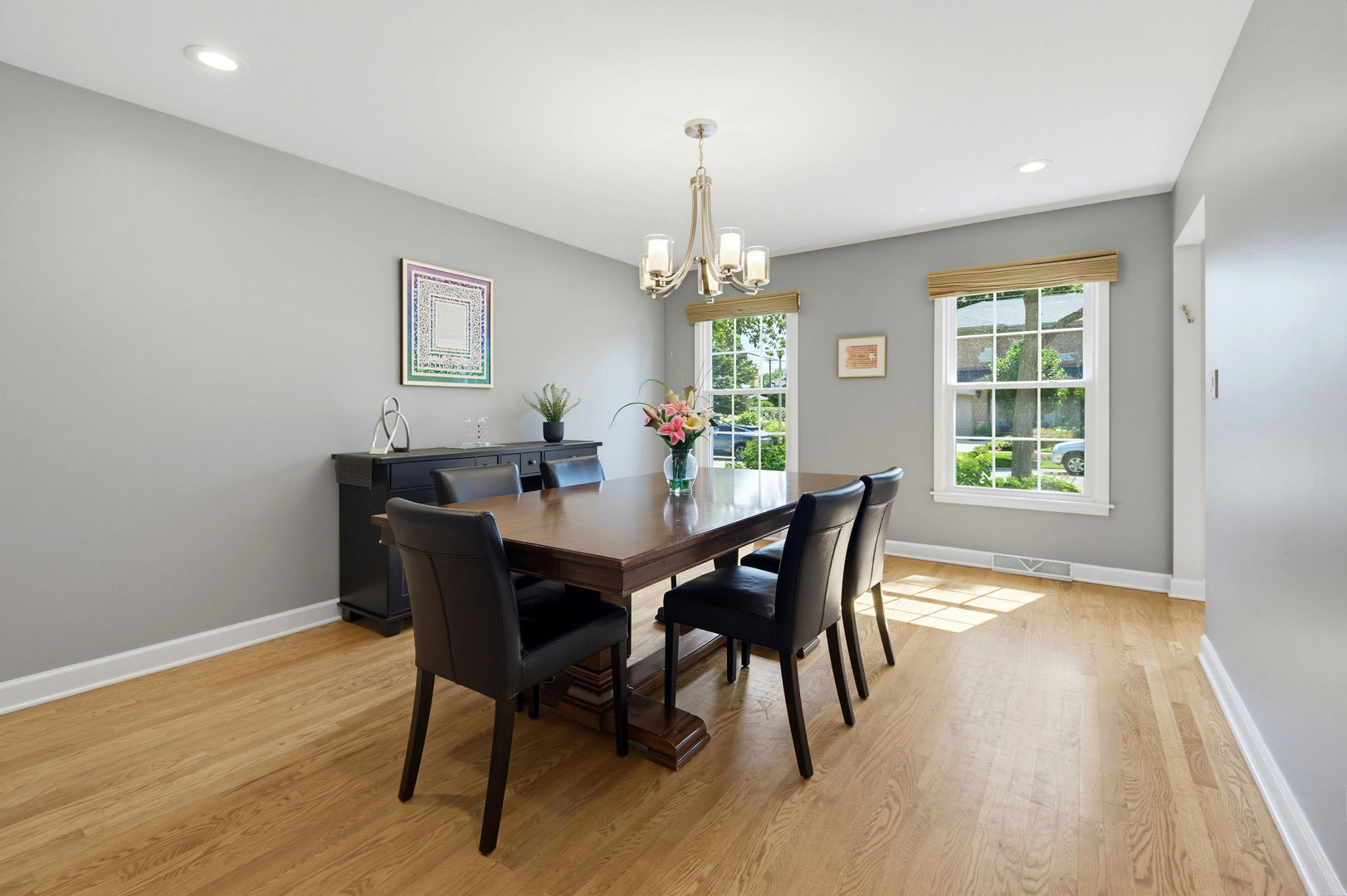 9200 Ridgeway Avenue Evanston, IL 60203 - Photo 6 of 33 a view of a dining room with furniture window and wooden floor
