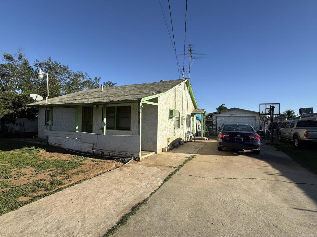 6929 37th Street Riverside, CA 92509 - Photo 1 of 13 a view of a house with a yard