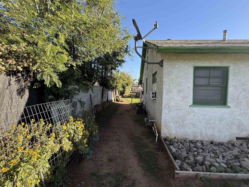 6929 37th Street Riverside, CA 92509 - Photo 7 of 13 a front view of a house with a yard