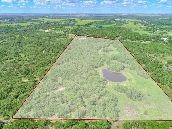 a view of a yard with an outdoor space