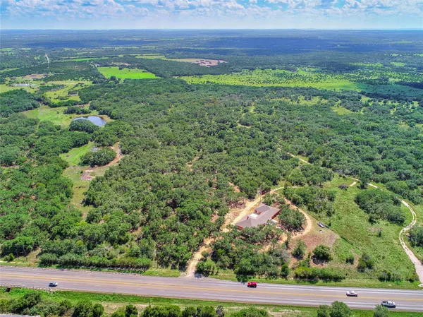 a view of a yard with an outdoor space
