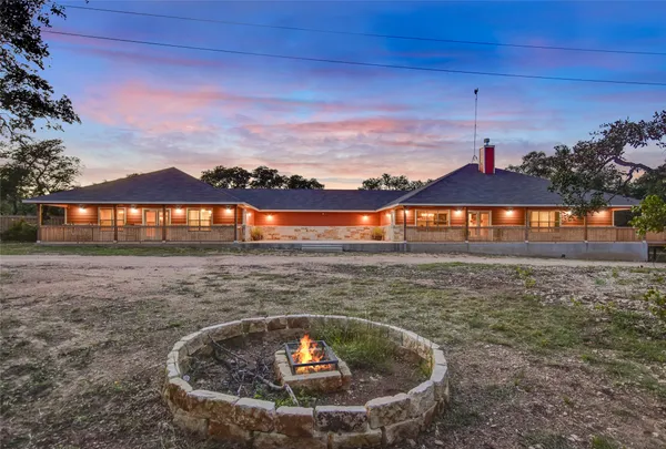 a view of a lake with a big yard