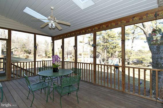 3721 Ligon Road Ellicott City, MD 21042 - Photo 13 of 30 a view of a dining room with furniture window and outside view