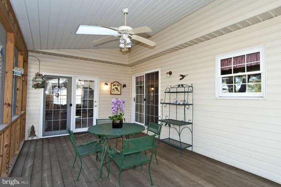 3721 Ligon Road Ellicott City, MD 21042 - Photo 28 of 30 a view of a dining room with furniture window and wooden floor