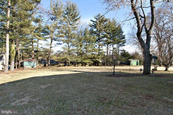 3721 Ligon Road Ellicott City, MD 21042 - Photo 30 of 30 a view of a field with trees in the background