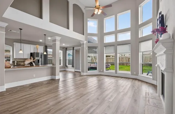 a view of a balcony with wooden floor