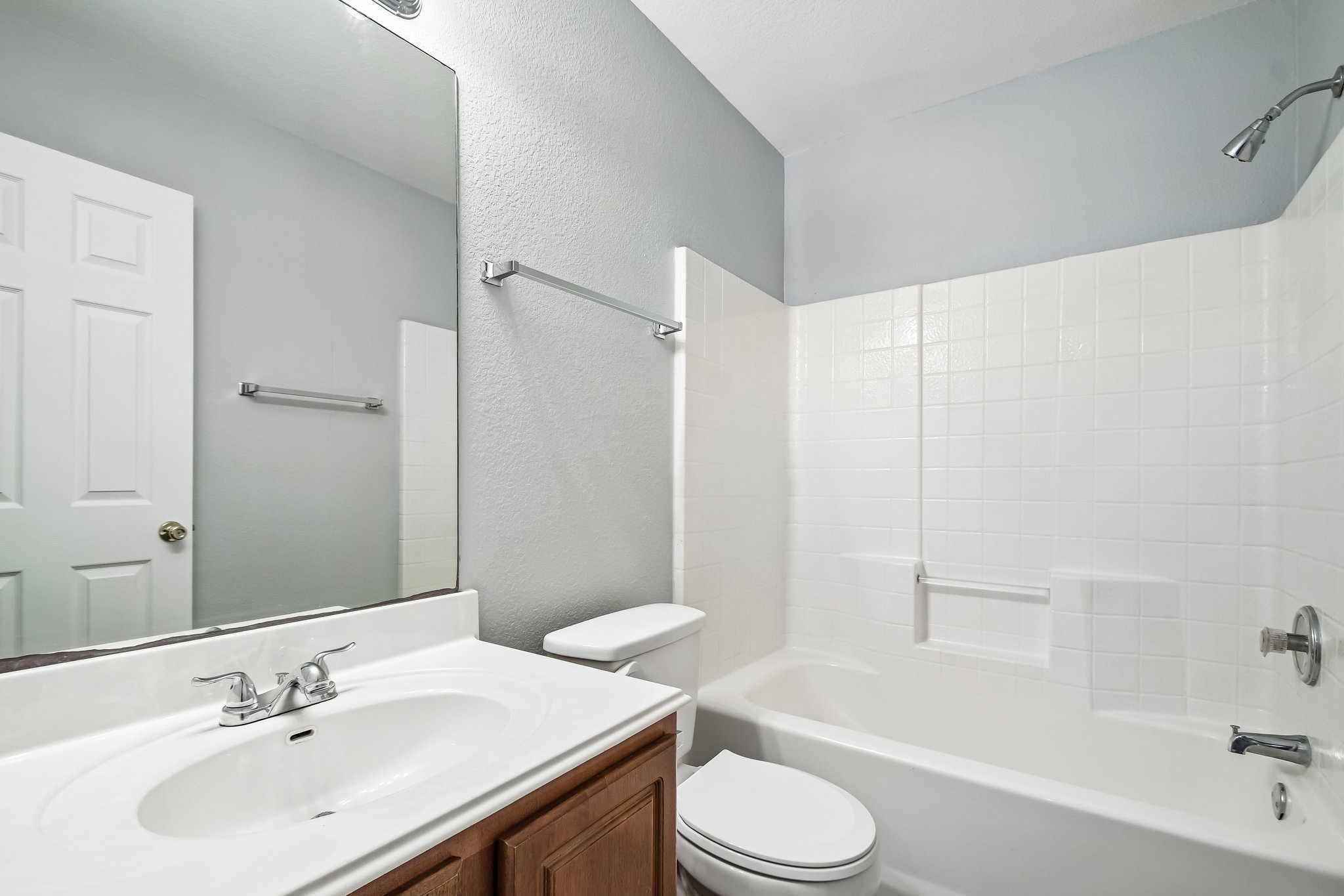 205 Cavalry Trail Elgin, TX 78621 - Photo 28 of 32 a bathroom with a sink toilet tub and shower