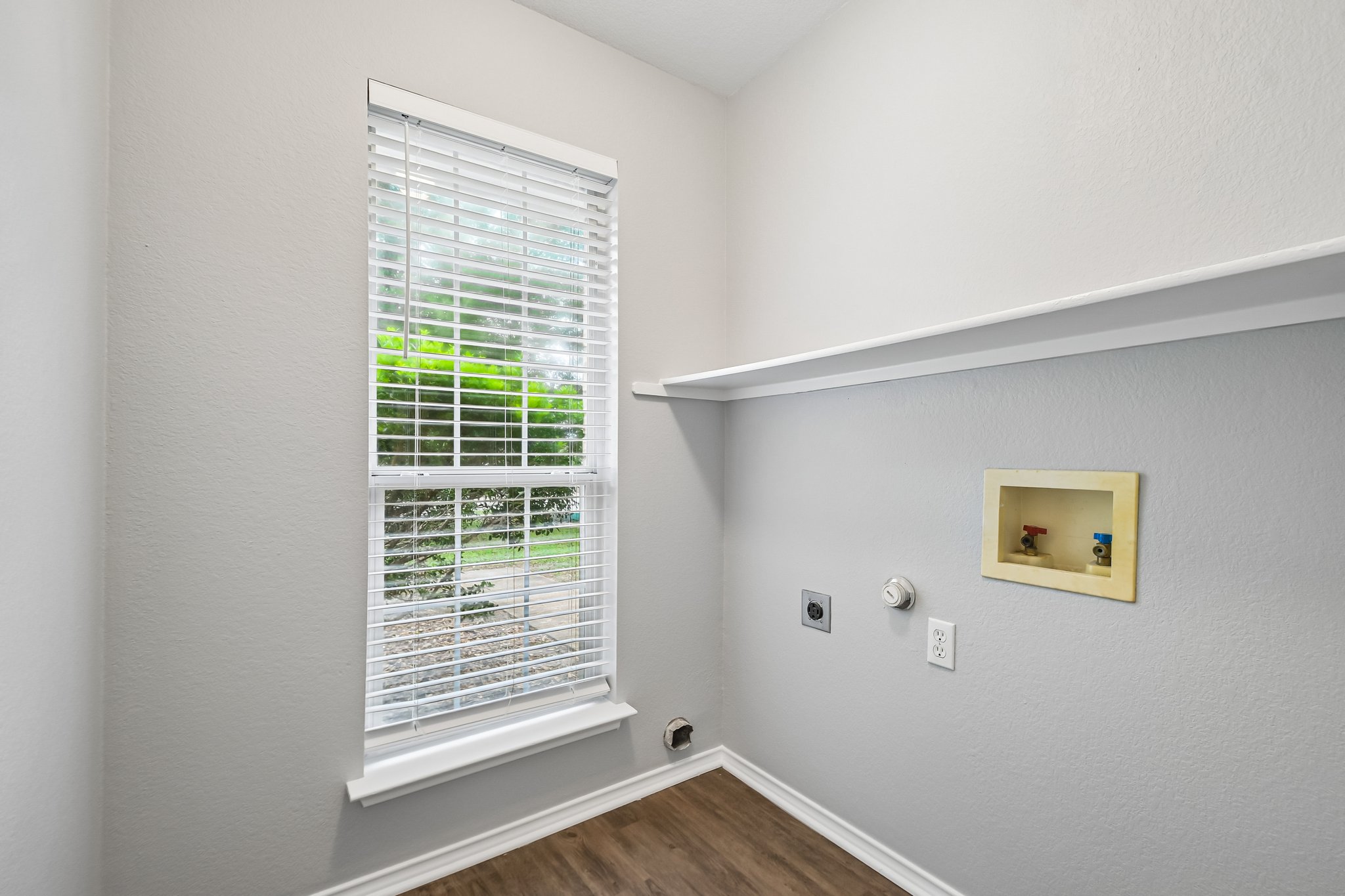 205 Cavalry Trail Elgin, TX 78621 - Photo 29 of 32 a view of an empty room with a window