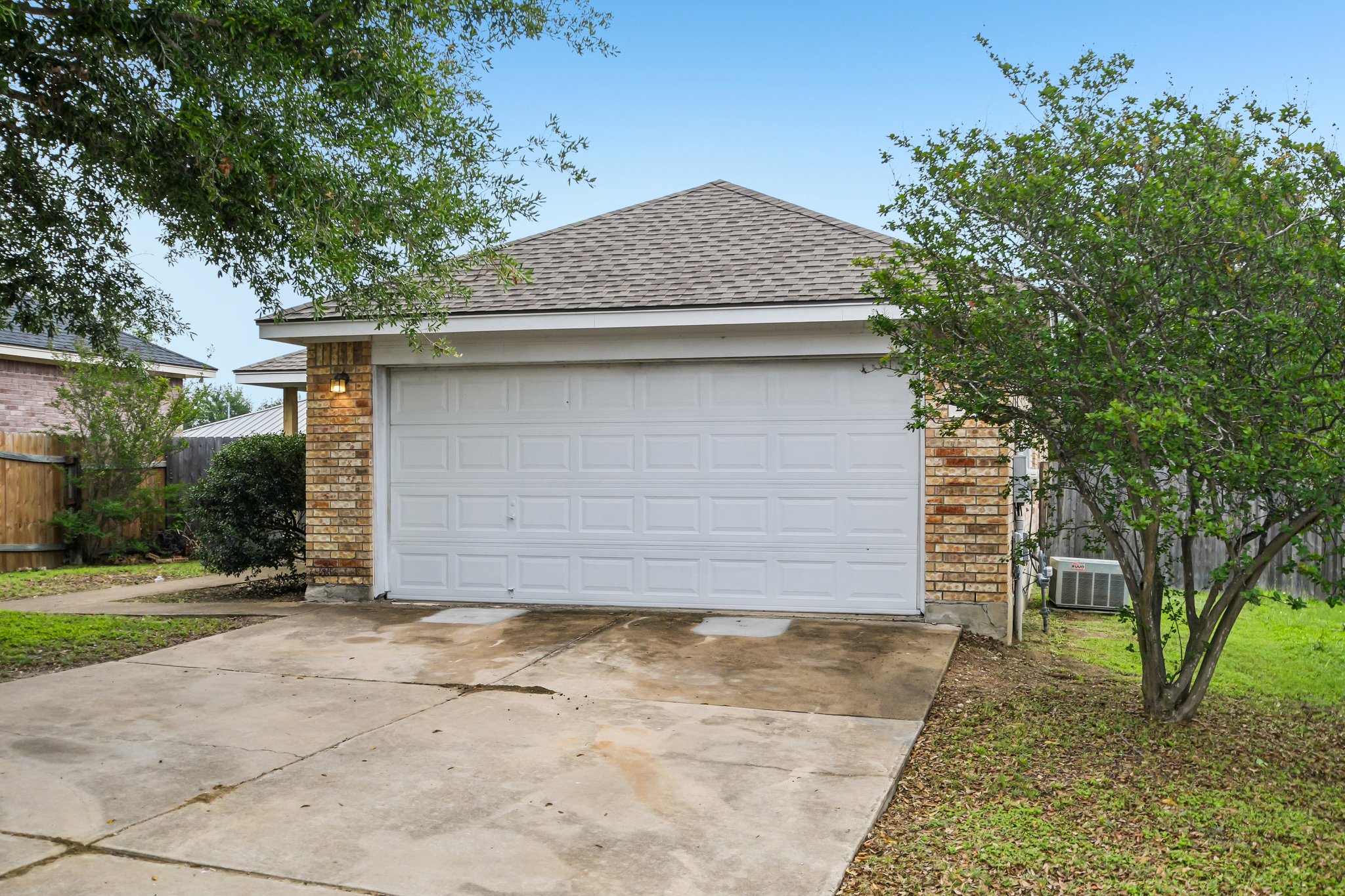 205 Cavalry Trail Elgin, TX 78621 - Photo 3 of 32 a front view of a house with a yard