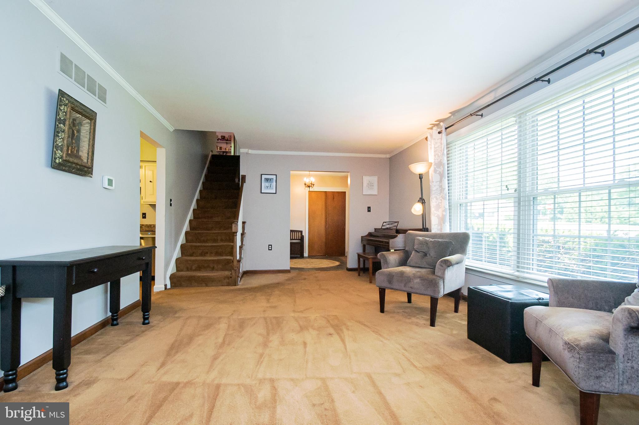 231 Rhett Lane Elkton, MD 21921 - Photo 11 of 40 Living room to kitchen and stairs to second floor