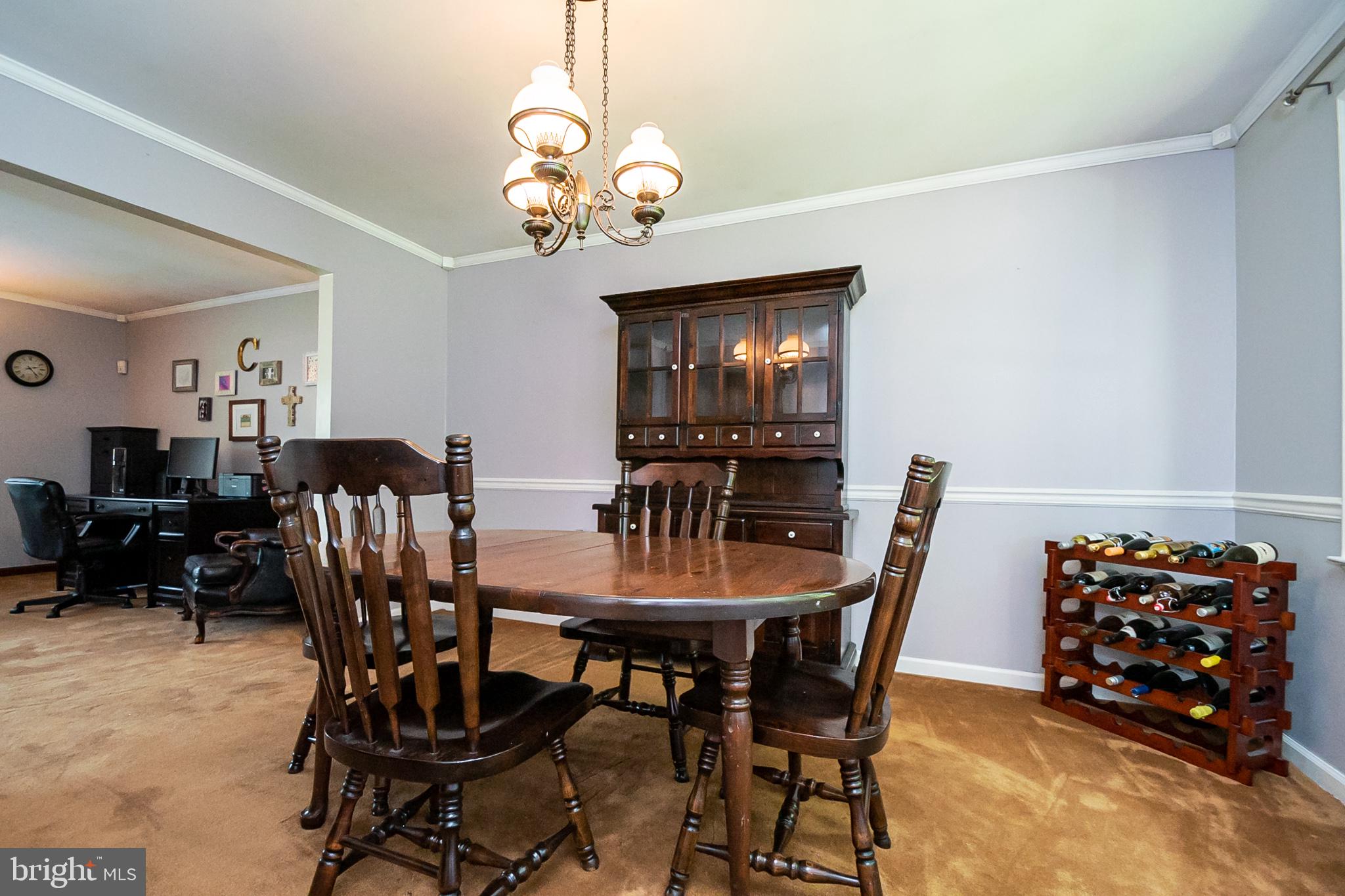 231 Rhett Lane Elkton, MD 21921 - Photo 17 of 40 Crown molding and chair rail in dining room