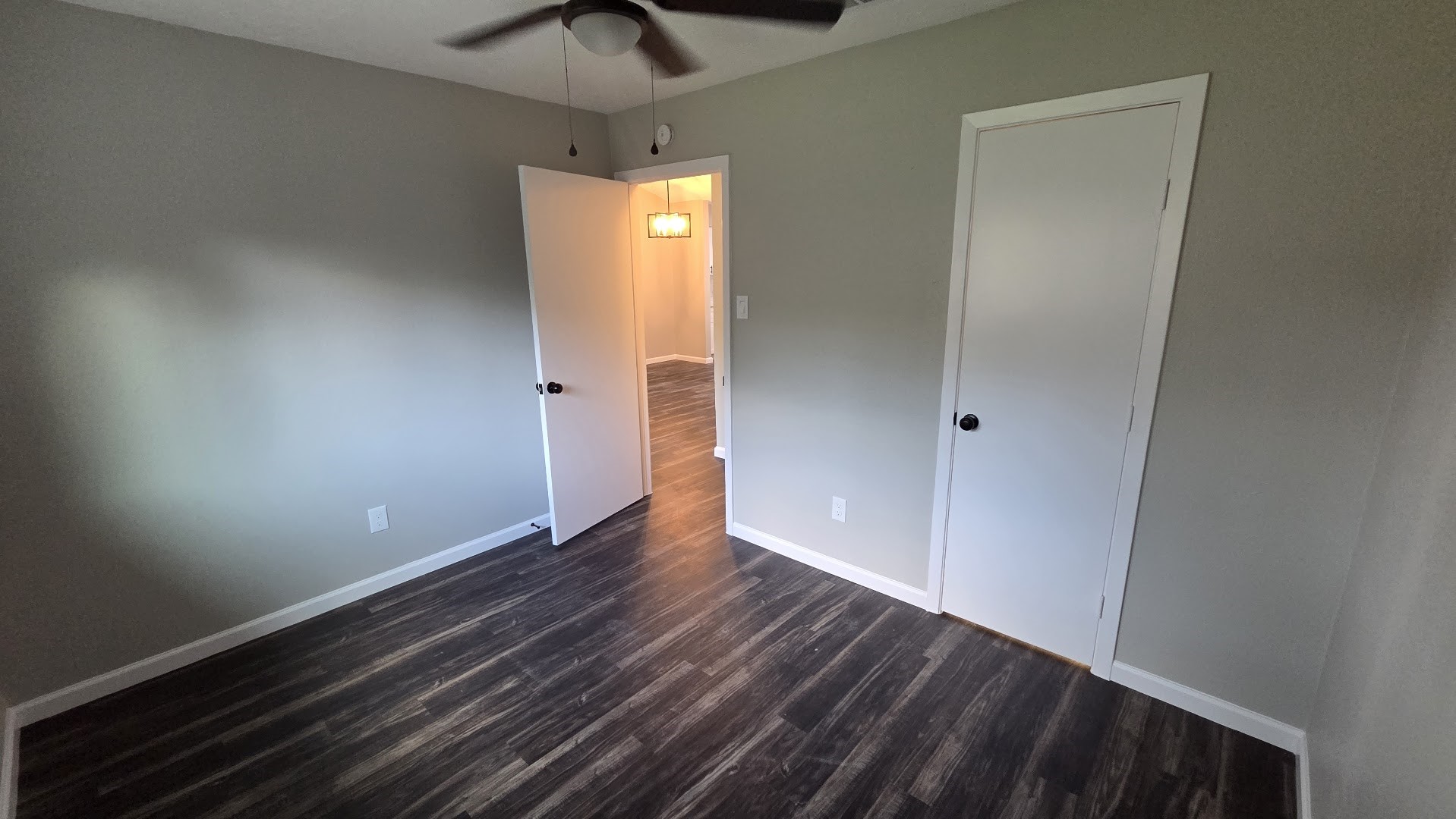4815 Hickorygate Drive Spring, TX 77373 - Photo 8 of 16 a view of an empty room with wooden floor and a window
