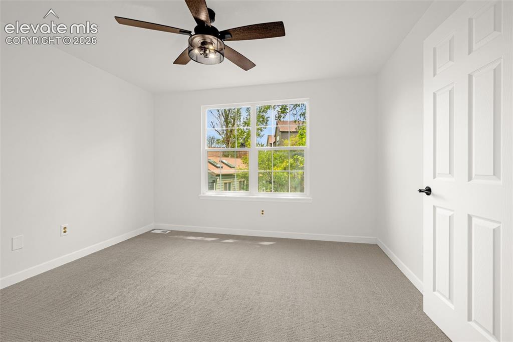 17396 East Rice Circle, Unit D Aurora, CO 80015 - Photo 15 of 48 Primary Bedroom