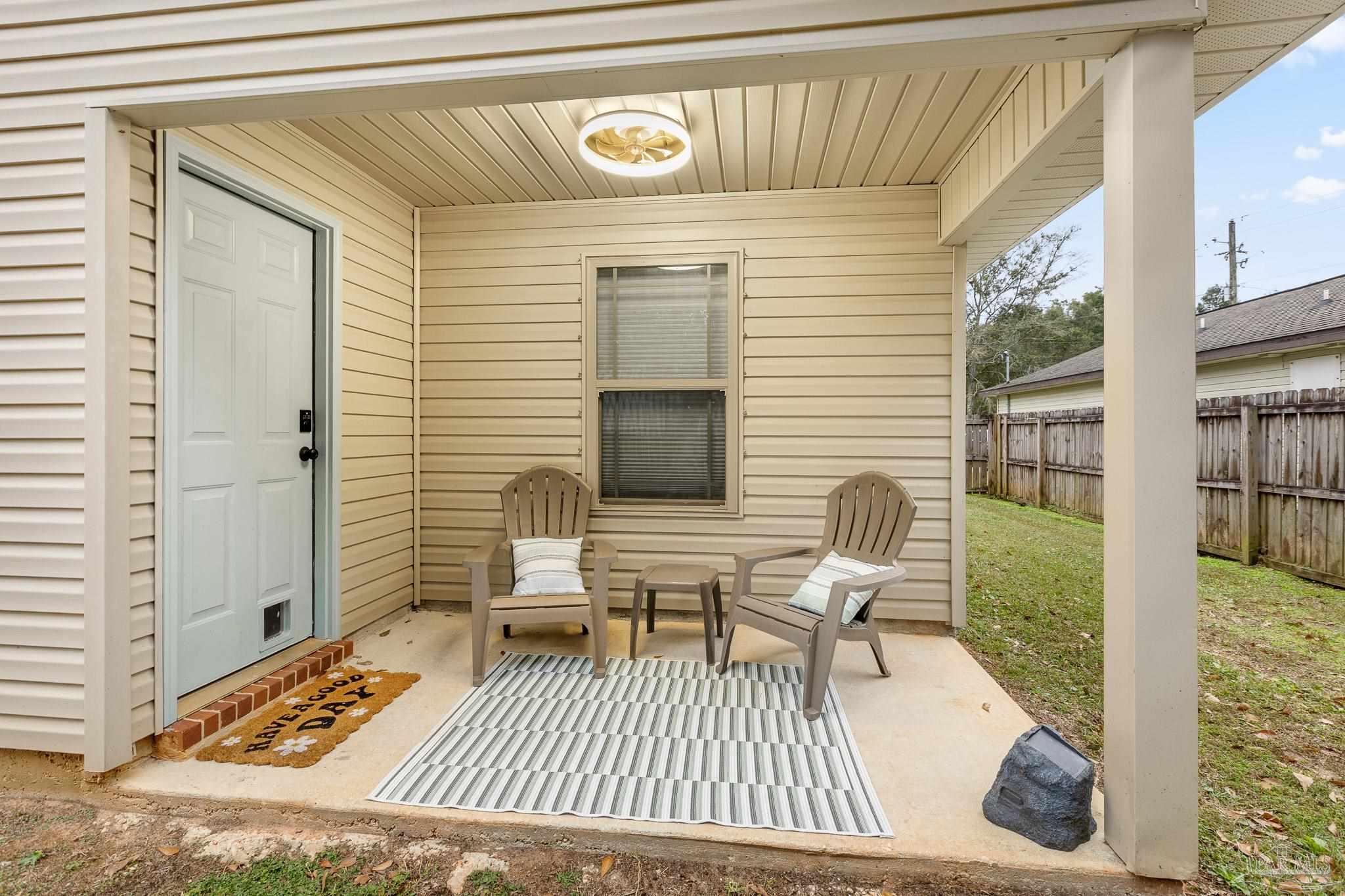 3963 Edgefield Street Pace, FL 32571 - Photo 21 of 30 a view of deck with patio