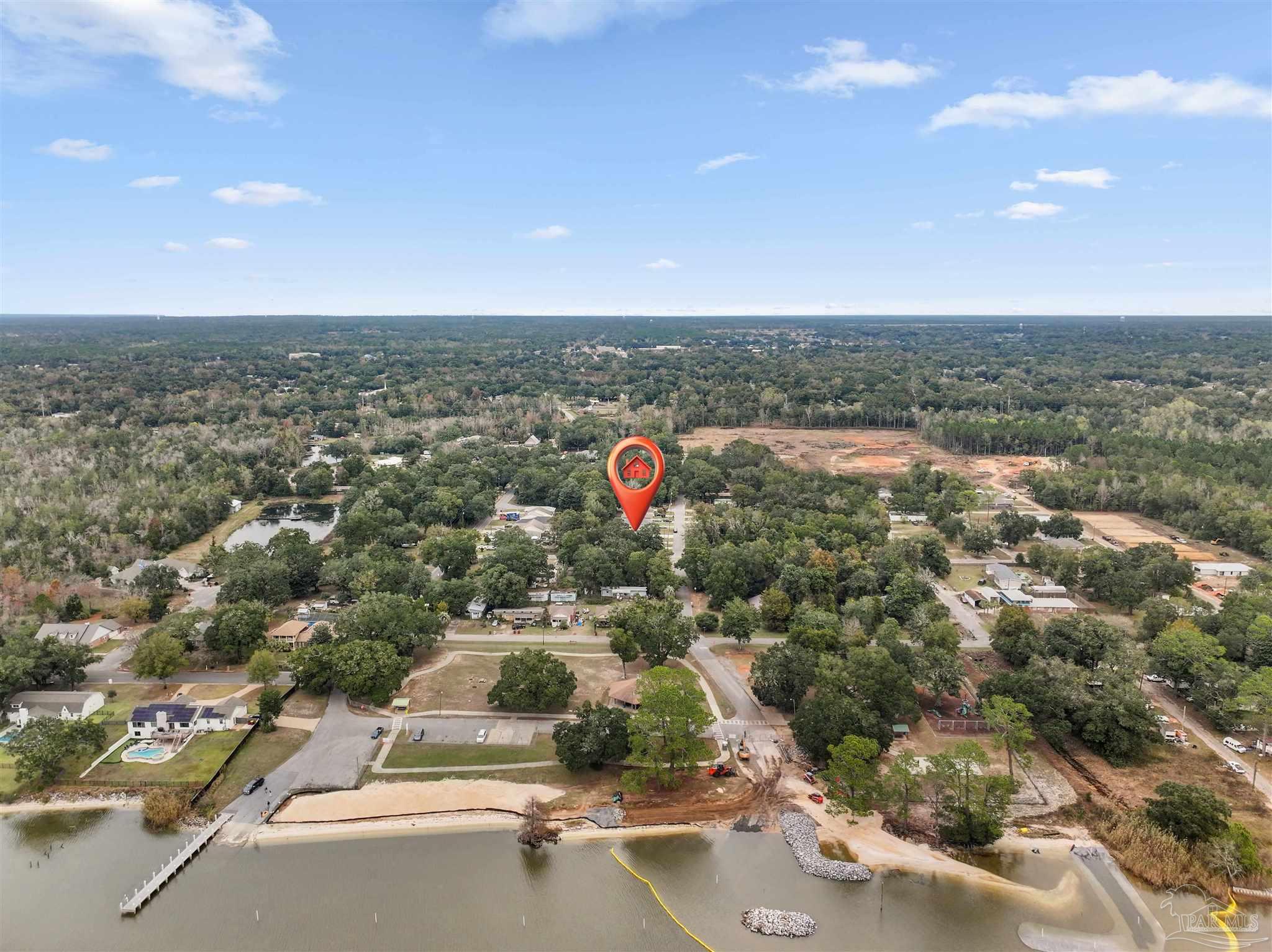 3963 Edgefield Street Pace, FL 32571 - Photo 26 of 30 an aerial view of residential houses with city view