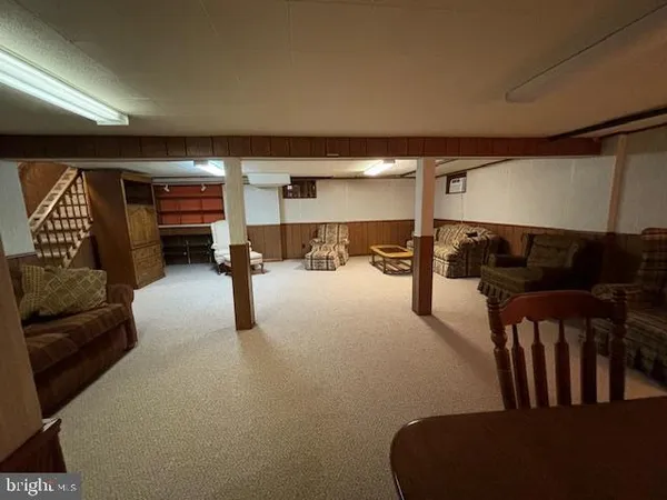 a lobby with furniture and window