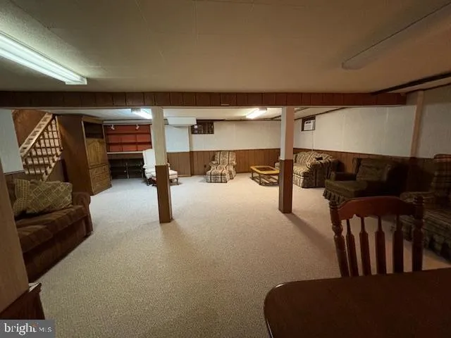 a lobby with furniture and window