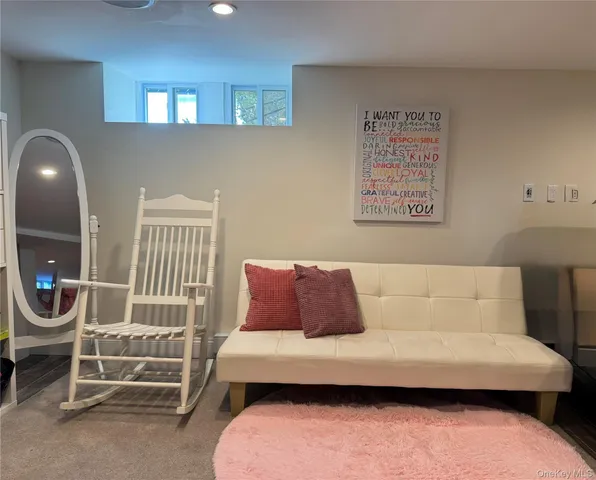 a bedroom with a bed and cabinets