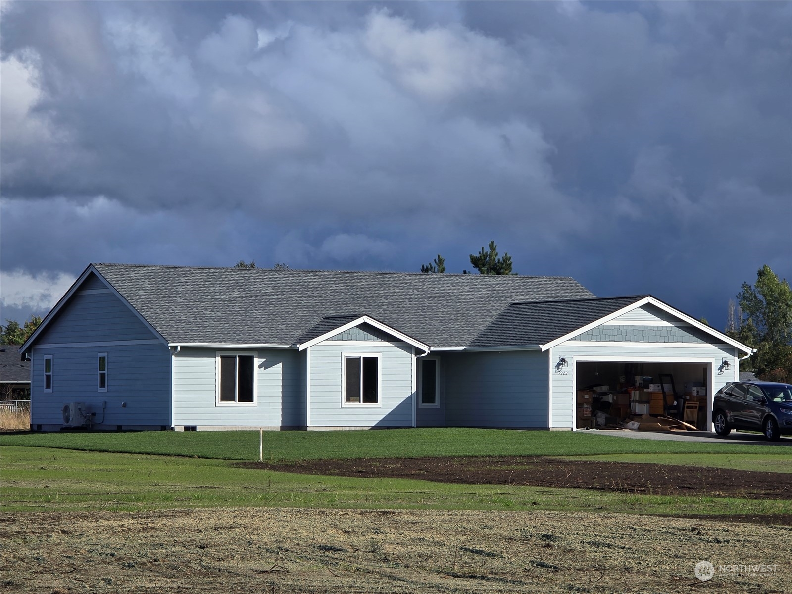 9222 179th Trail Southwest Rochester, WA 98579 - Photo 1 of 1 a front view of a house with a garden