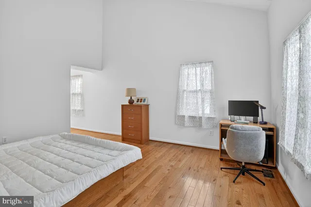 a workspace with furniture and a window