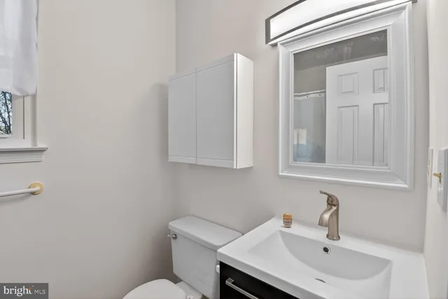 a bathroom with a sink and a toilet