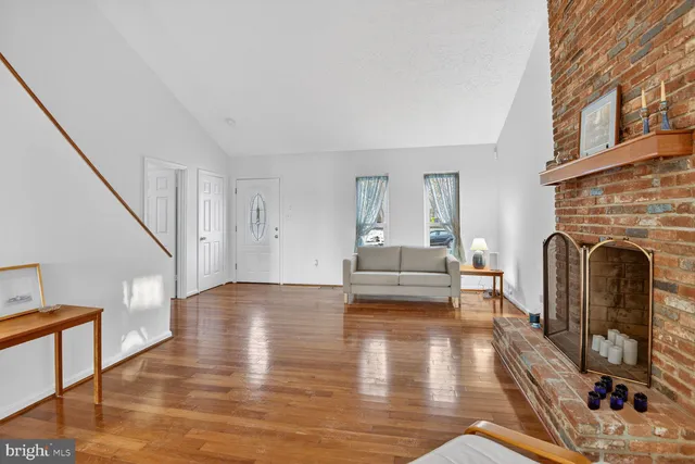 a view of livingroom with furniture and fireplace