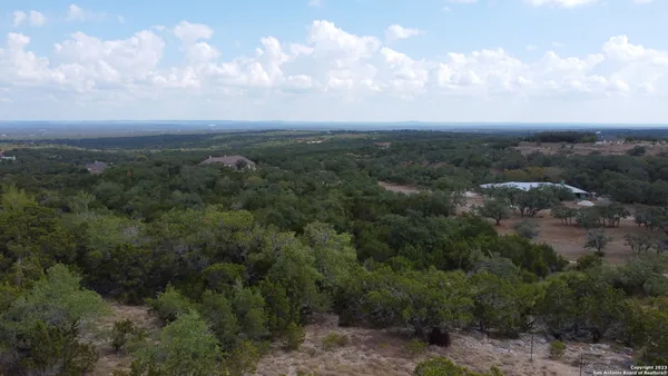 an aerial view of residential house and around