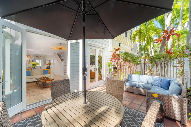 a large white kitchen with a window