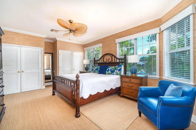 a bathroom with a double vanity sink and mirror