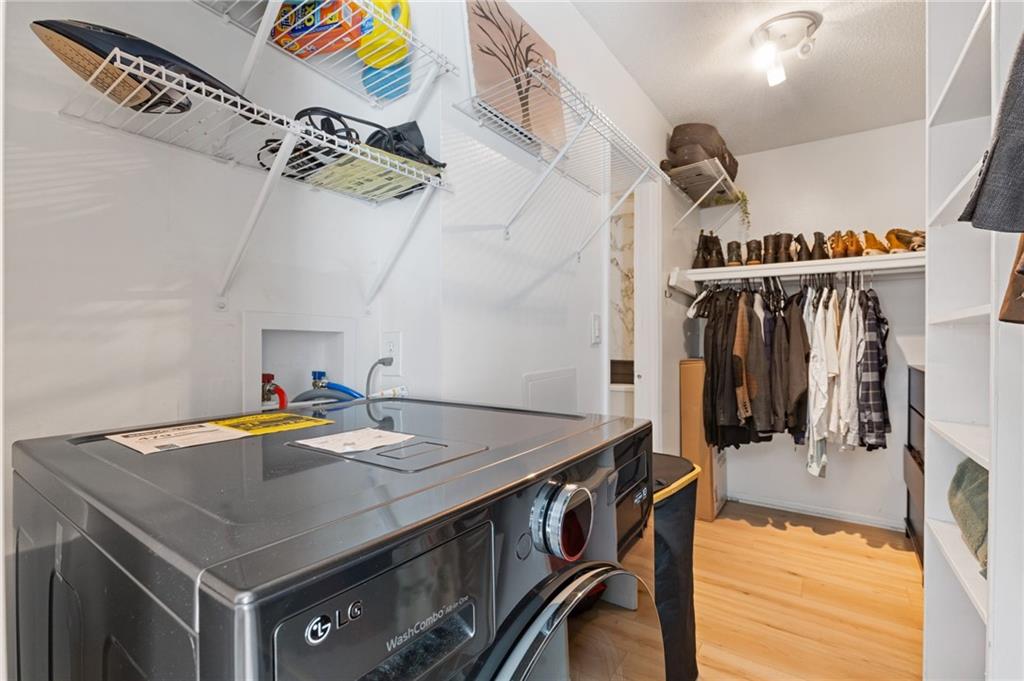 6851 Roswell Road, Unit N9 Atlanta, GA 30328 - Photo 14 of 16 a kitchen with a table and a stove