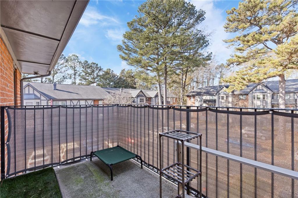 6851 Roswell Road, Unit N9 Atlanta, GA 30328 - Photo 15 of 16 a view of a wrought iron fences