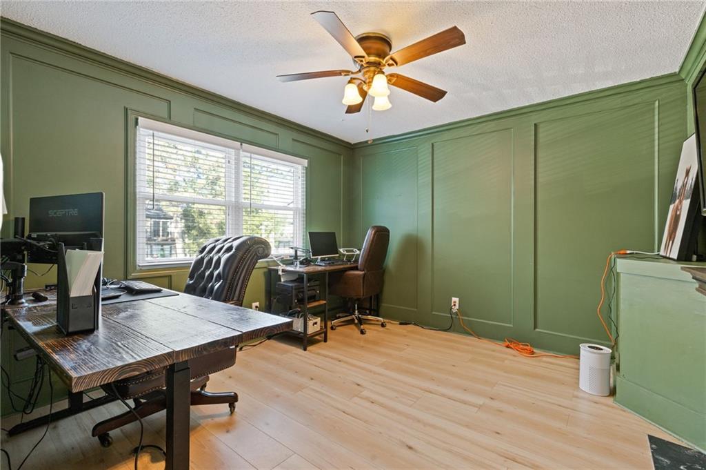 6851 Roswell Road, Unit N9 Atlanta, GA 30328 - Photo 6 of 16 a view of a workspace with furniture and a window