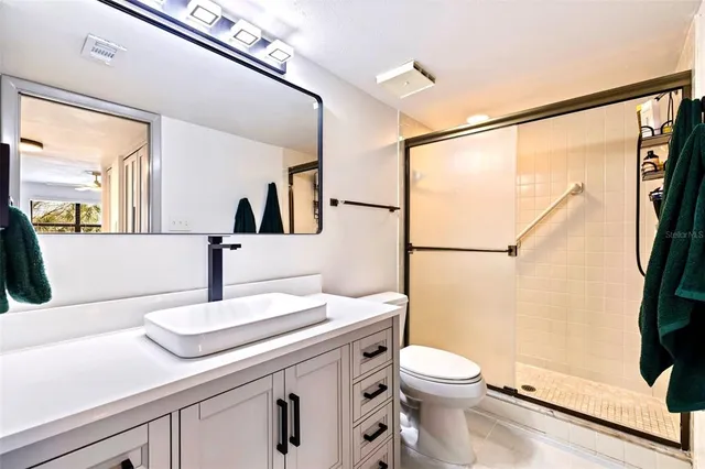 an aerial view of a house with a garden