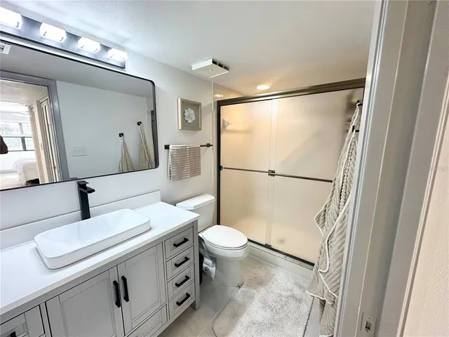 an aerial view of residential building and lake