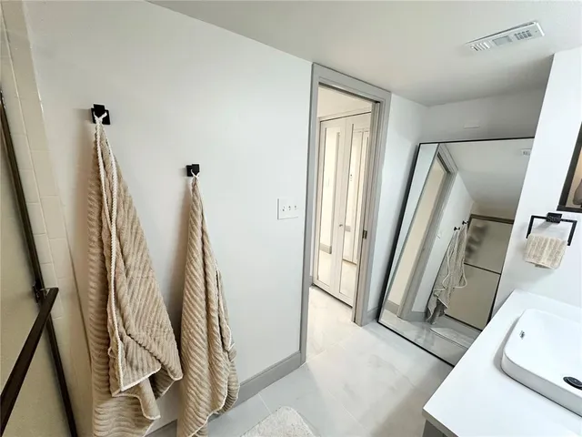 a outdoor space with lots of tables and chairs