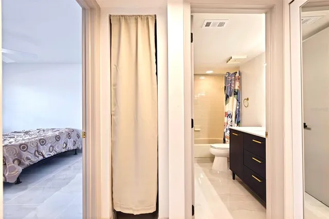 a view of a roof deck with wooden floor and seating space