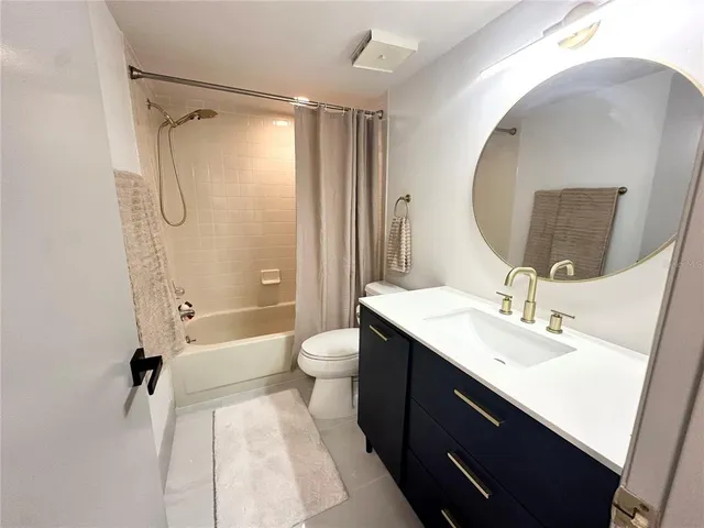 a view of a balcony with wooden floor